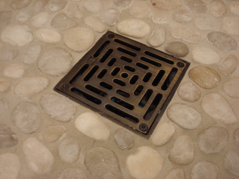 https://www.coppersinksonline.com/images/thumbs/0044100_sonoma-forge-decorative-shower-drain.jpeg